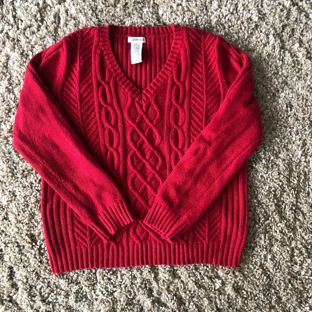 Red V-neck with red metalic thread detail.